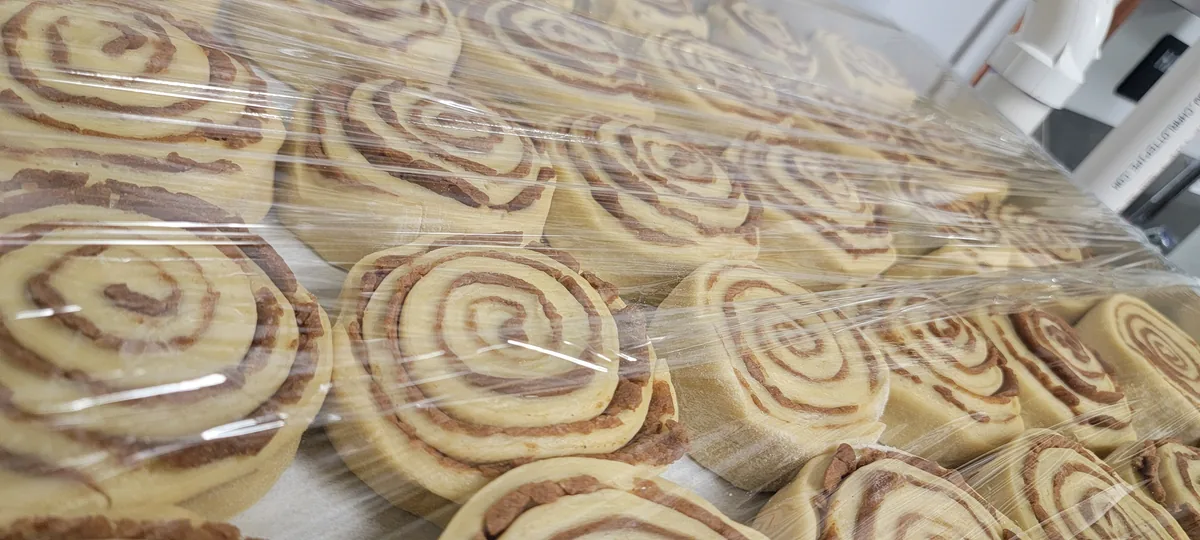 Tray of cinnamon rolls before baking